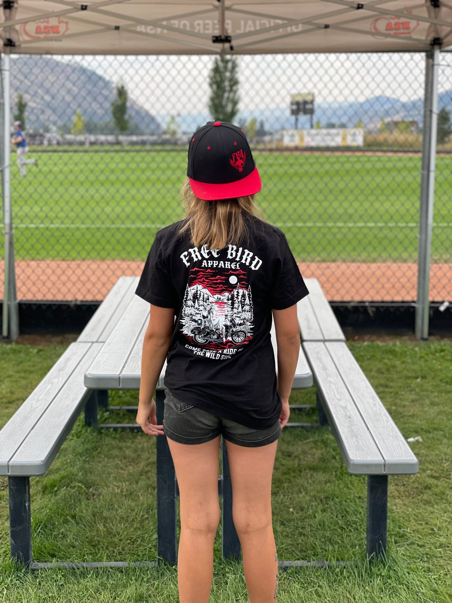 “COME TAKE A RIDE ON THE WILD SIDE” TEE